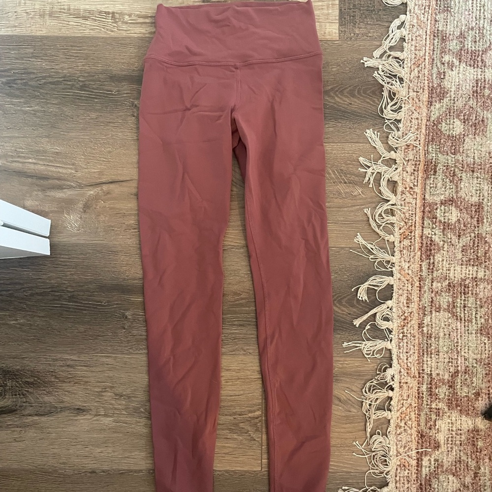 High-Waisted rose colored leggings from alo